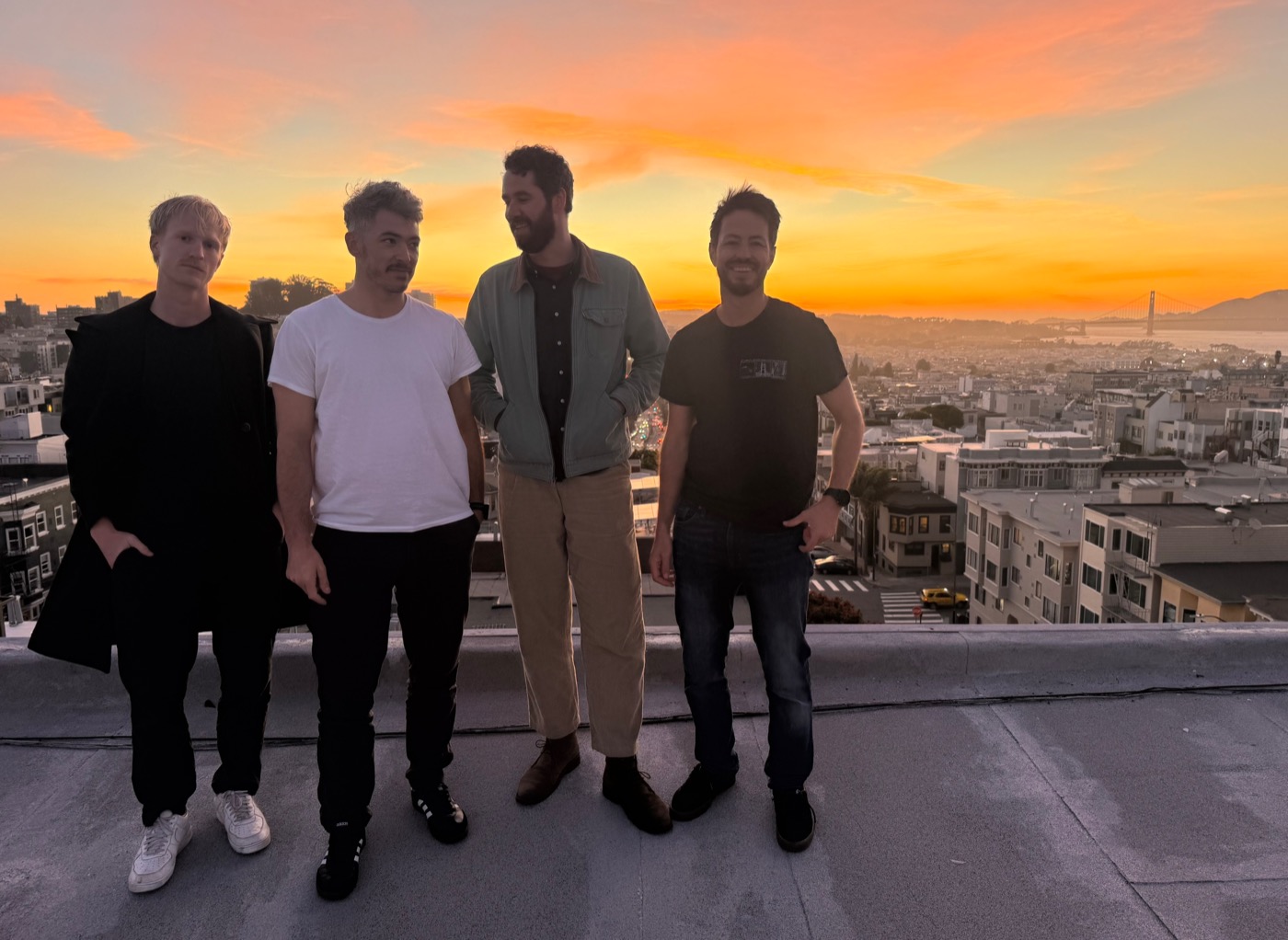 Ghost City — the band on a San Francisco rooftop at sunset